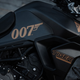 The Triumph Tiger is painted mat black with gold 007 details